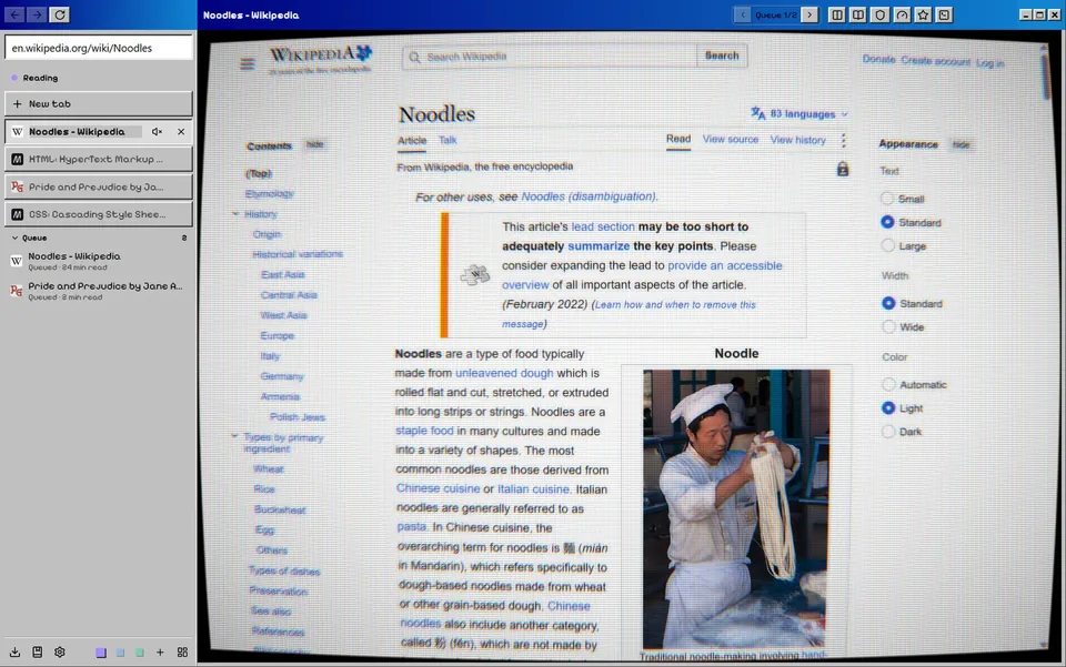 Classic 98 with the CRT screen on, showing curvature and scanlines over a Wikipedia page